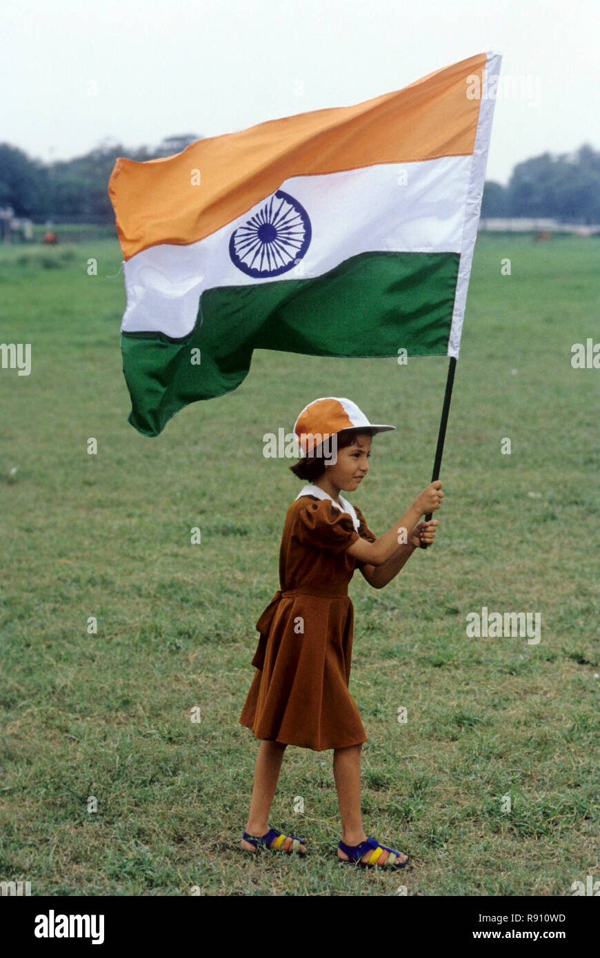 Girl holding national flag walking hires stock photography and images