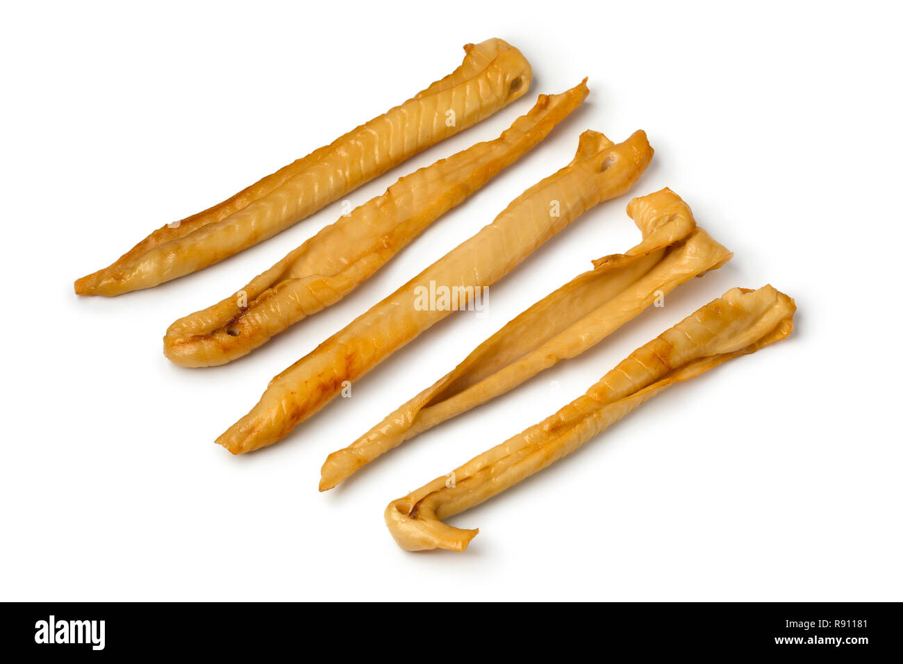 Fresh smoked pieces of spiny dogfish isolated on white background Stock