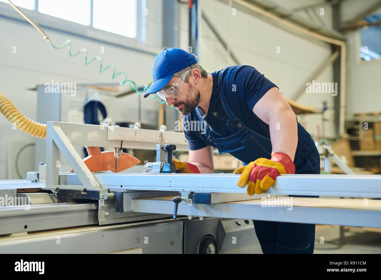 Worker of furniture factory Stock Photo Alamy