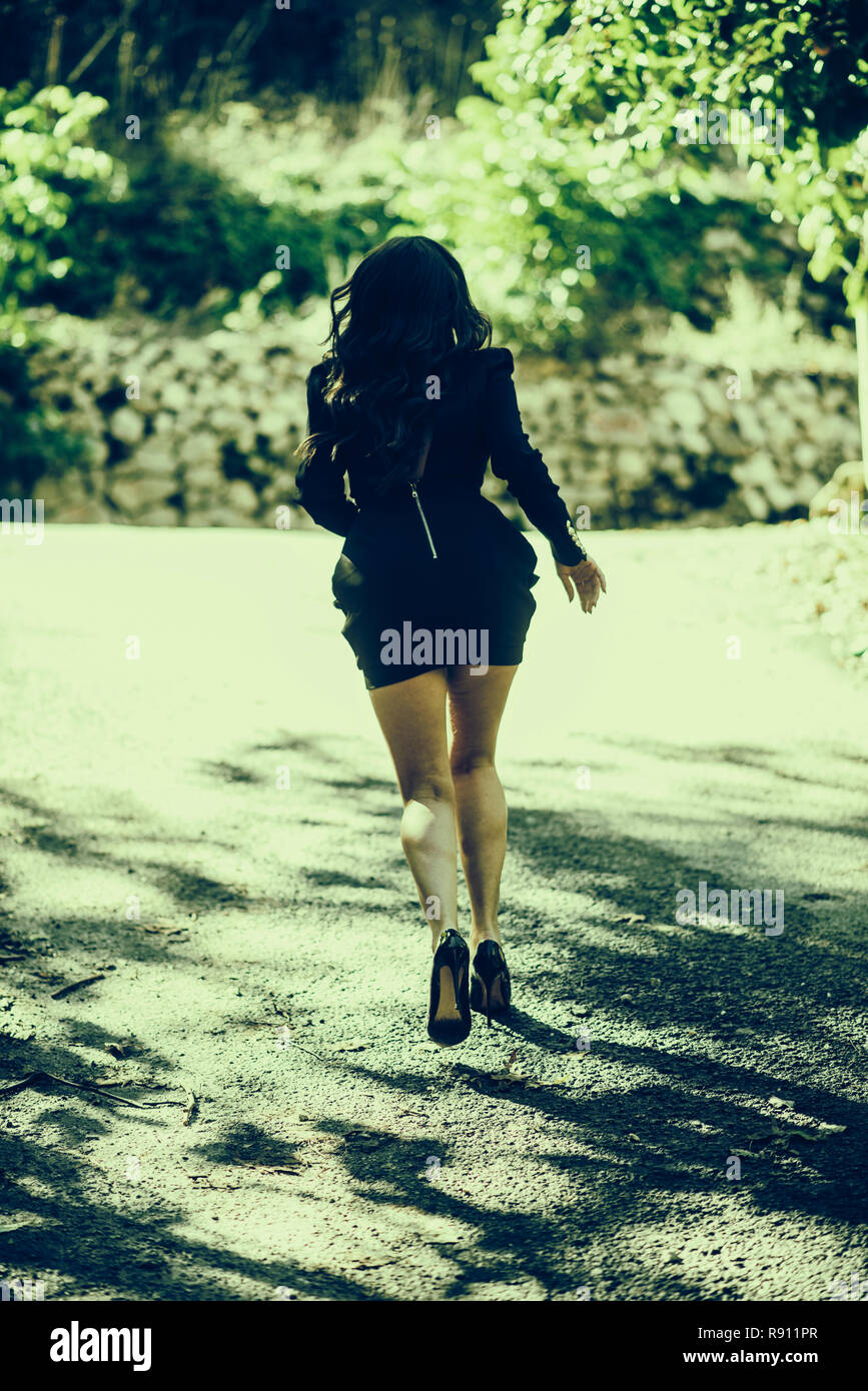 Wearing short dress high heels hires stock photography and images Alamy