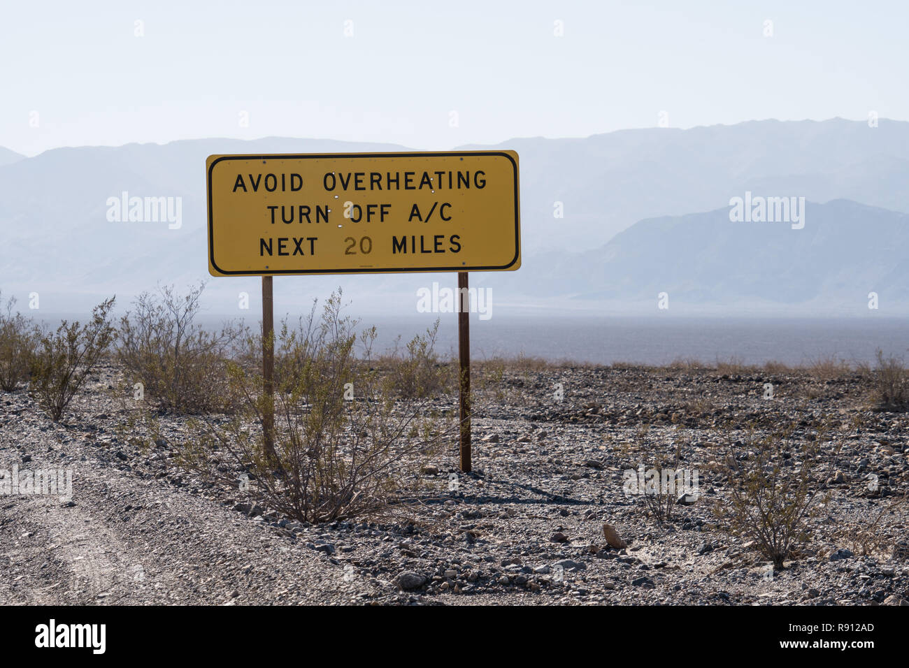 Sign warning drivers through Death Valley National Park to turn off