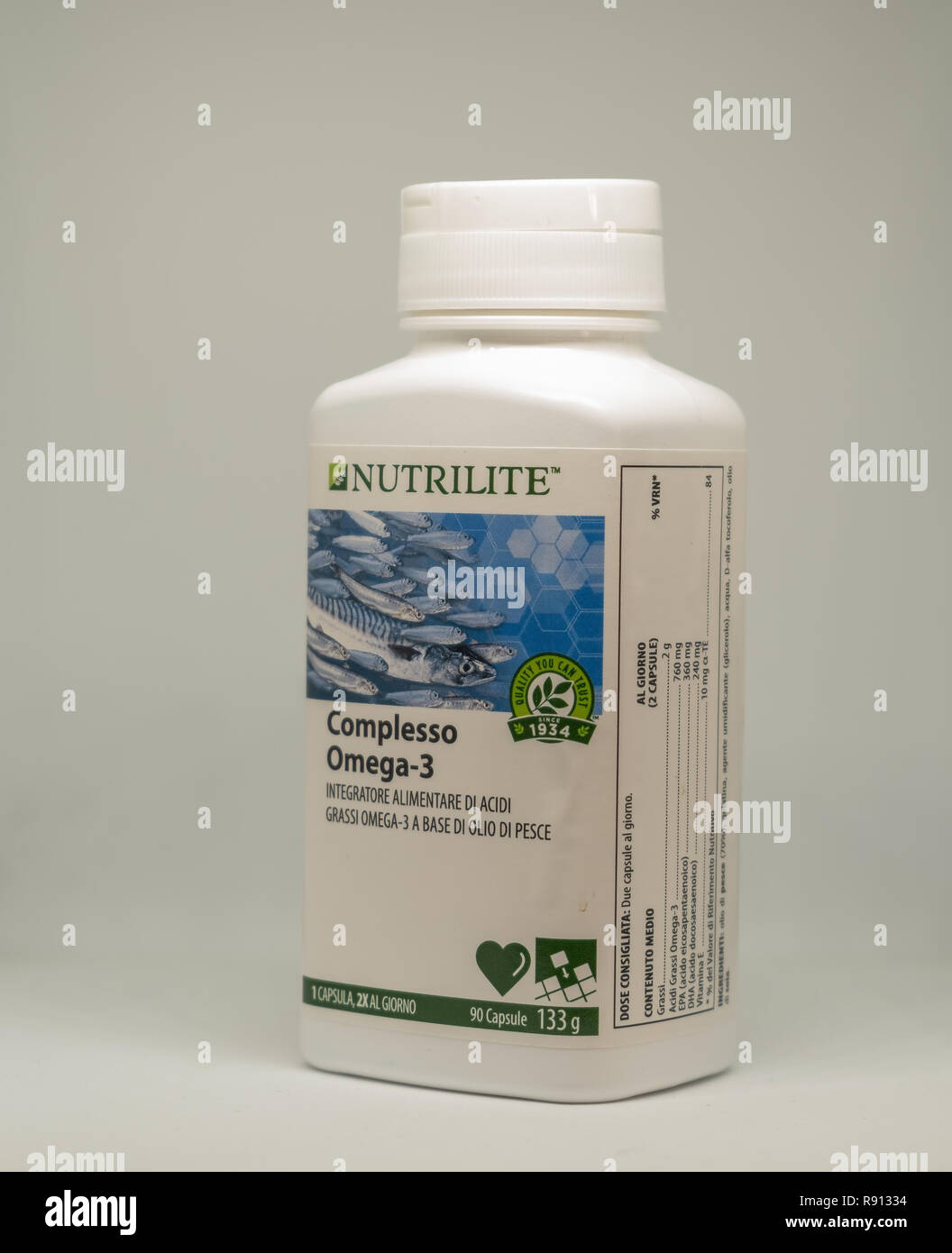 CAGLIARI,ITALY - DECEMBER 2018: Containers and Pile of capsules Omega 3 on  white background. Nutrilite natural and vegan supplements Stock Photo -  Alamy
