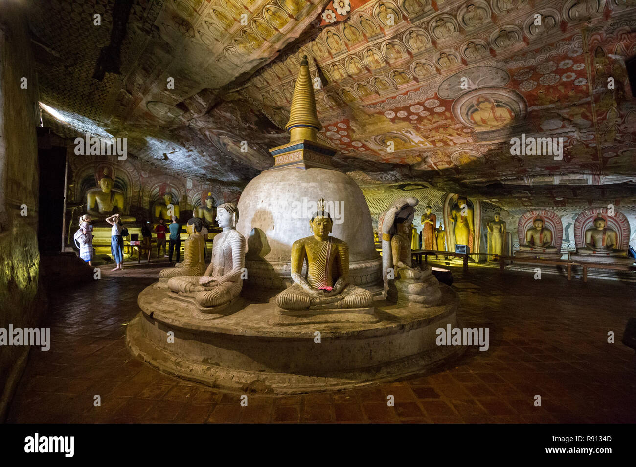 Stupa and statues inside Dambulla Cave Temple, Sri Lanka Stock Photo