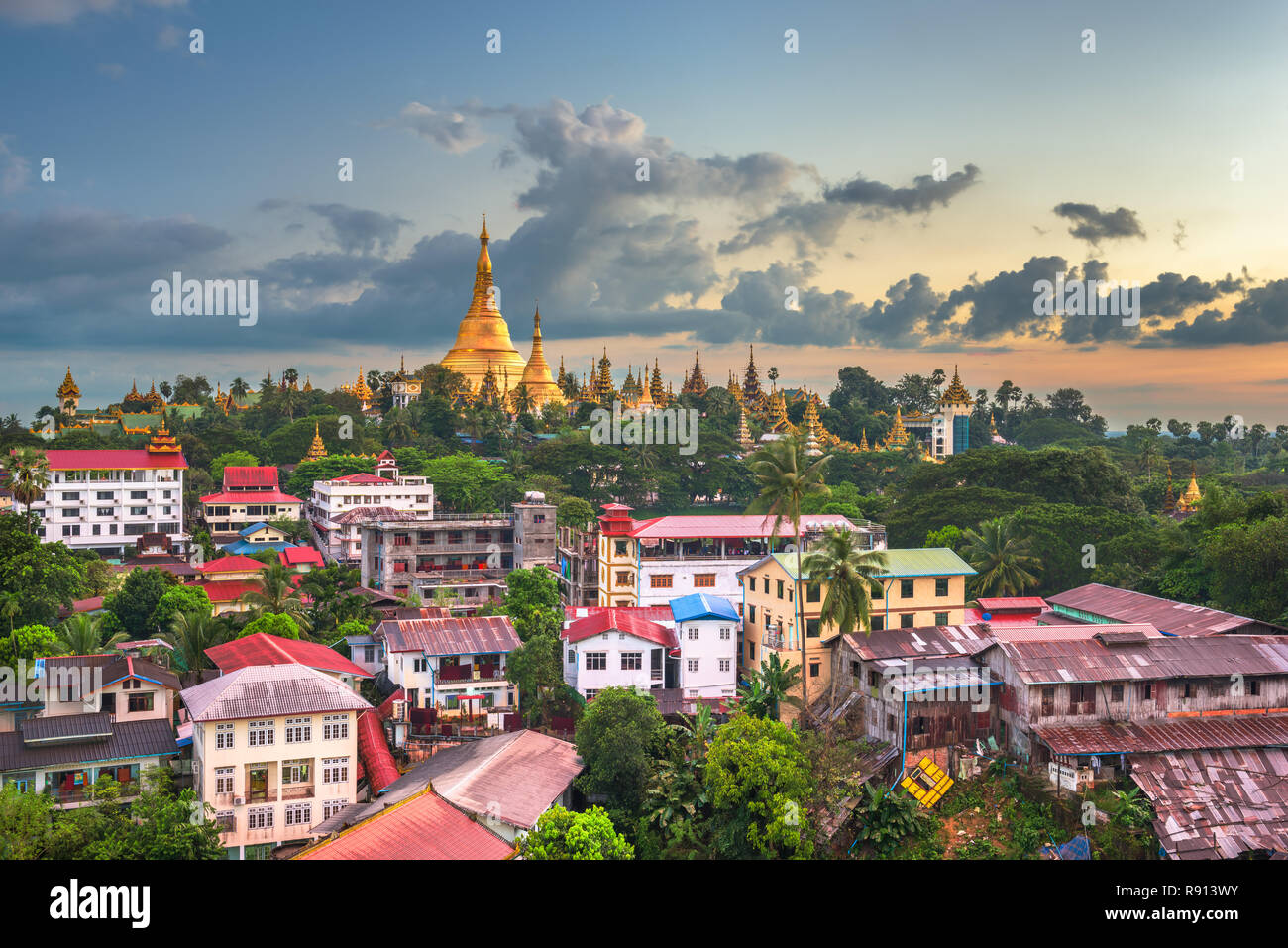 Yangon, Myanmar skyline with Shwedagon Pagoda at dusk. Stock Photo