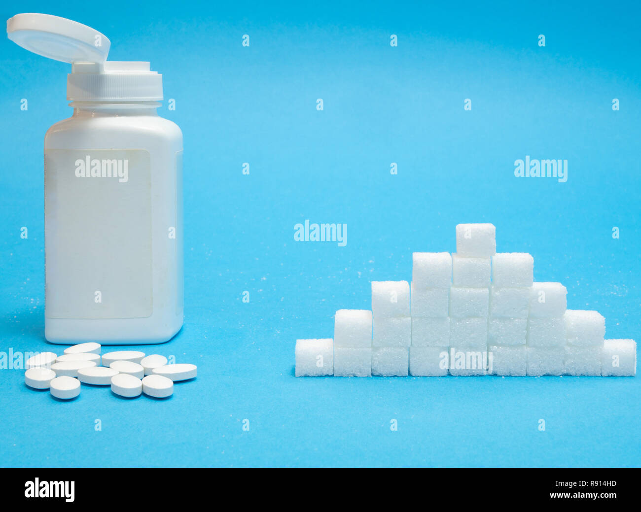 white tablets pills of sugar substitute sweetener with big bottle blank