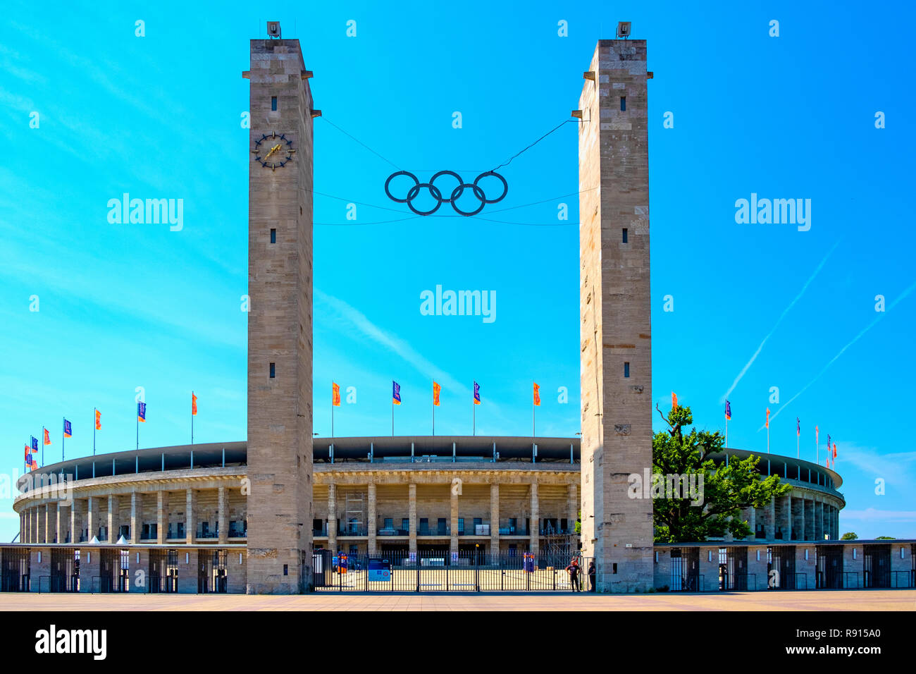 Berlin, Berlin state / Germany - 2018/07/31: Exterior of the historic Olympiastadion sports stadium originally constructed for the Summer Olympic in 1 Stock Photo