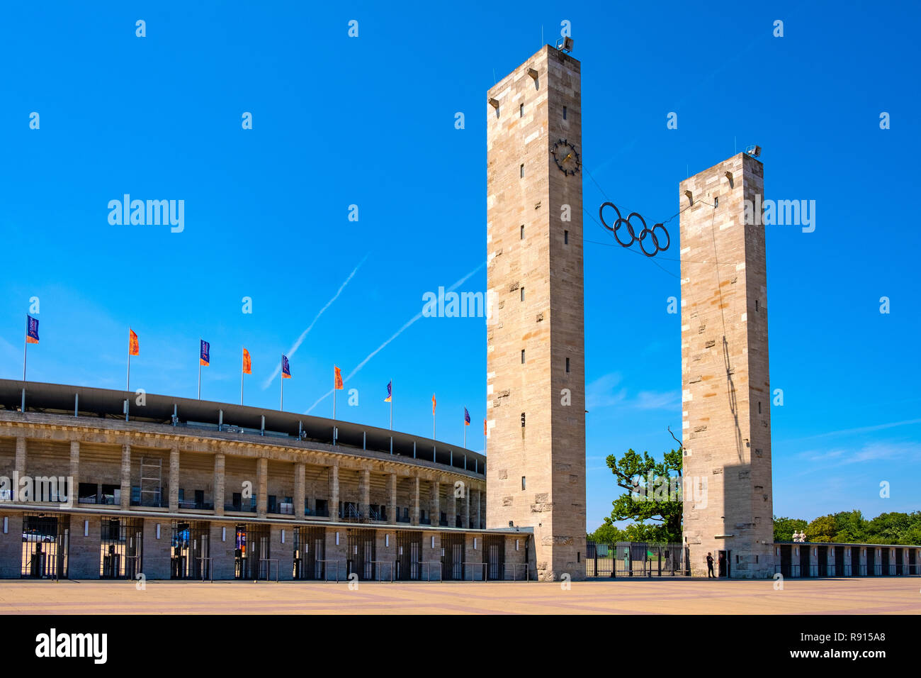 Berlin, Berlin state / Germany - 2018/07/31: Exterior of the historic Olympiastadion sports stadium originally constructed for the Summer Olympic in 1 Stock Photo