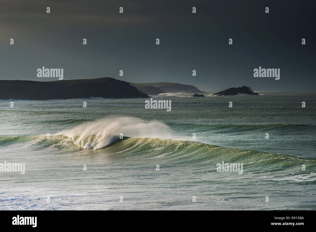 Darky stormy skies over the North Cornwall coast at Fistral in Newquay in Cornwall. Stock Photo