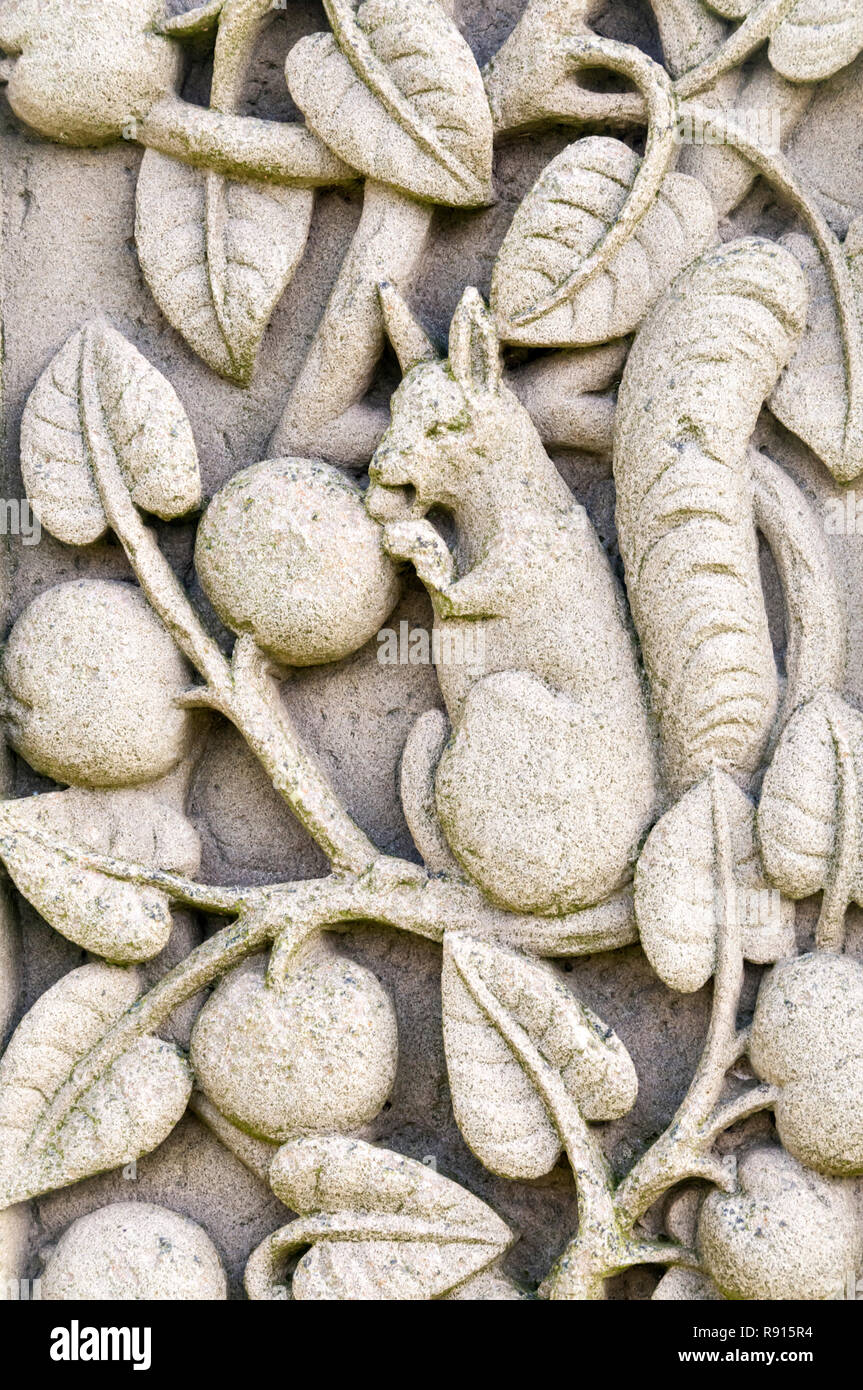 Detail of a carved squirrel on Cædmon's Cross in the churchyard of St Mary's church, Whitby. Stock Photo
