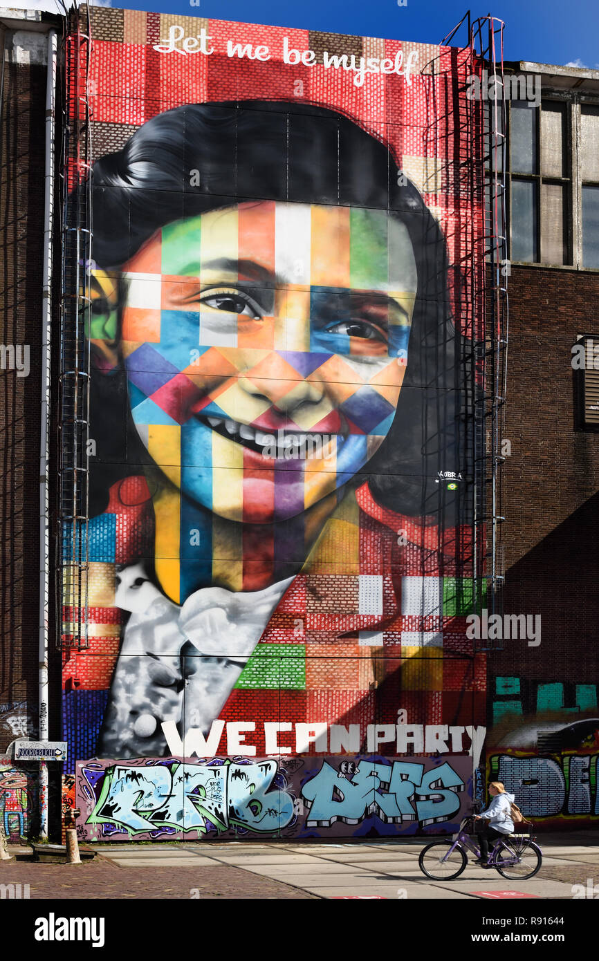 Mural of Anne Frank by Eduardo Kobra at the Street Art Museum at the NDSM in Amsterdam Noord, Netherlands. Stock Photo