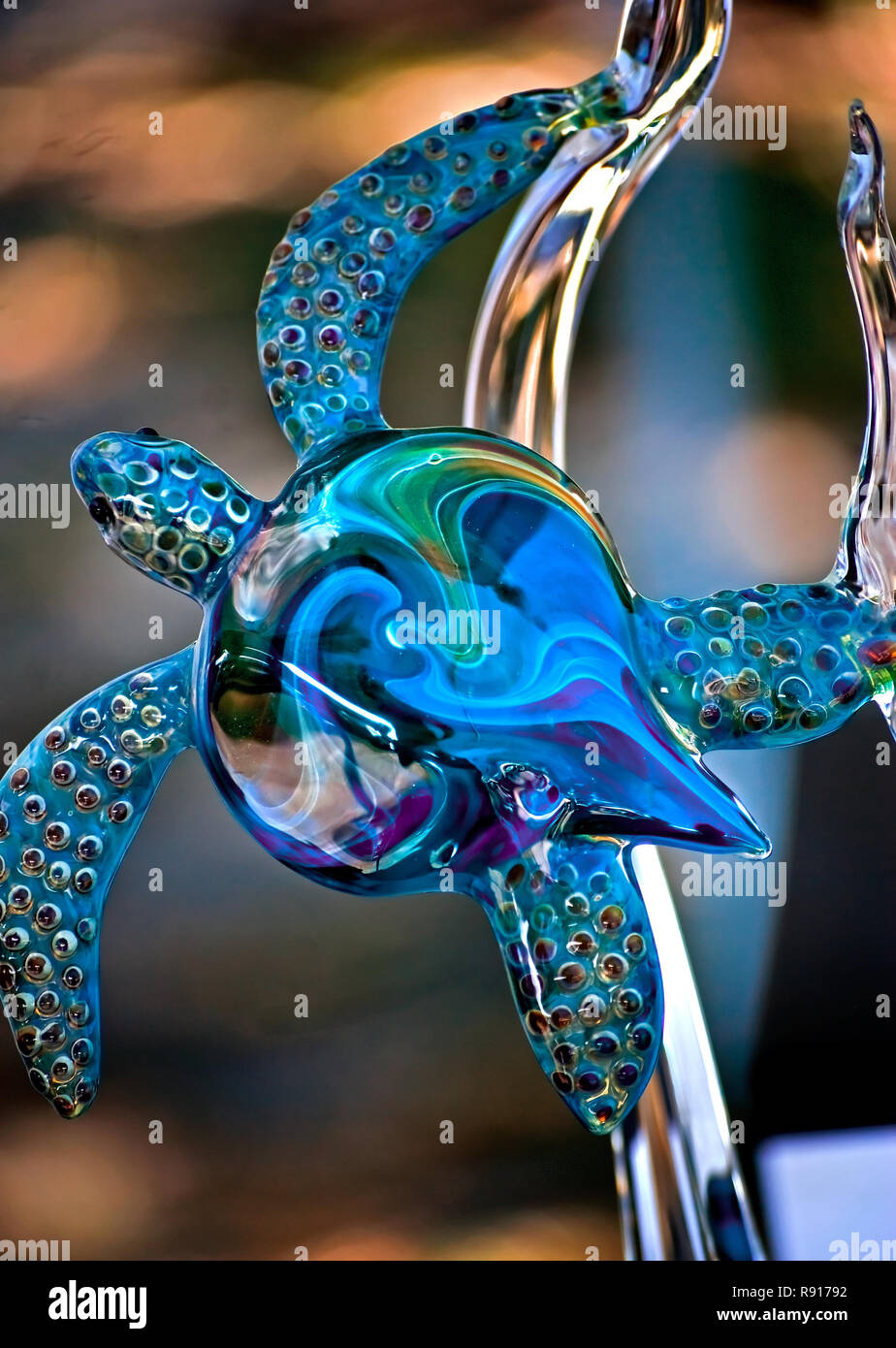 A glass sea turtle, created by artist Jill Elkins, is displayed at the Mary C. O'Keefe Cultural Center in Ocean Springs, Mississippi. Stock Photo