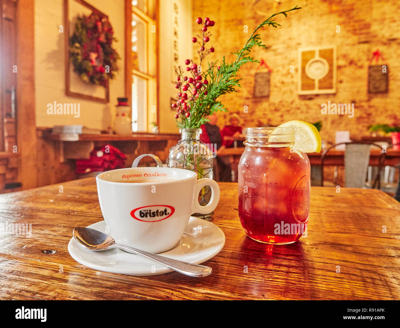 Coffee shop or cafe or restaurant interior with cup of espresso and sweet tea in the Lightnin' Bugs Cafe in Warm Springs GA. Stock Photo