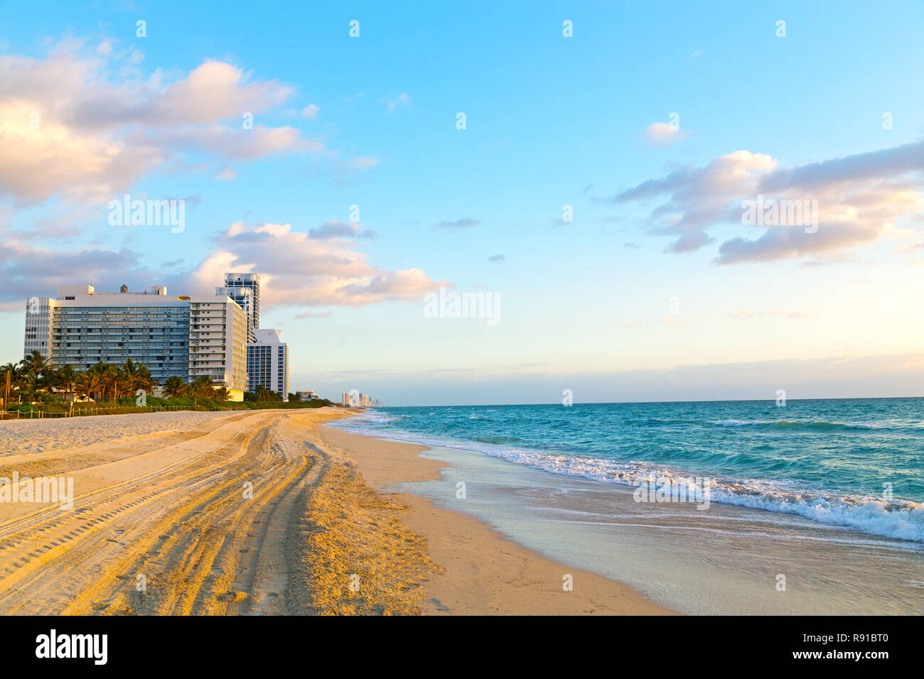 Spring morning at the ocean beach. Miami Beach at sunrise with resorts