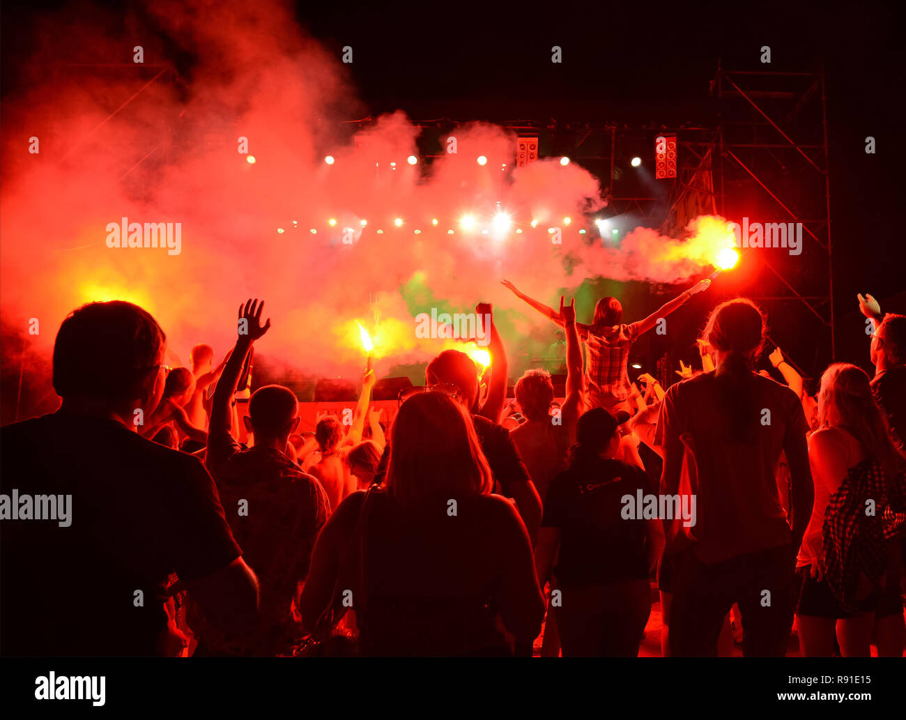 The audience watching the concert on stage an outdoor concert. openair