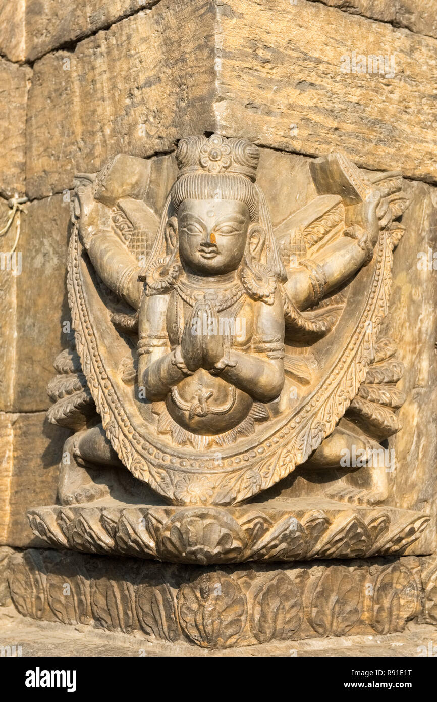 Hindu deities / gods carved into stone temple,  Pashupatinath Temple, Kathmandu, Nepal Stock Photo