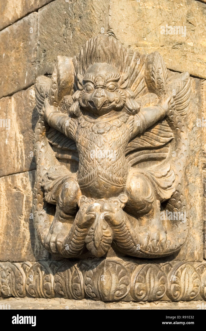 Hindu deities / gods carved into stone temple,  Pashupatinath Temple, Kathmandu, Nepal Stock Photo