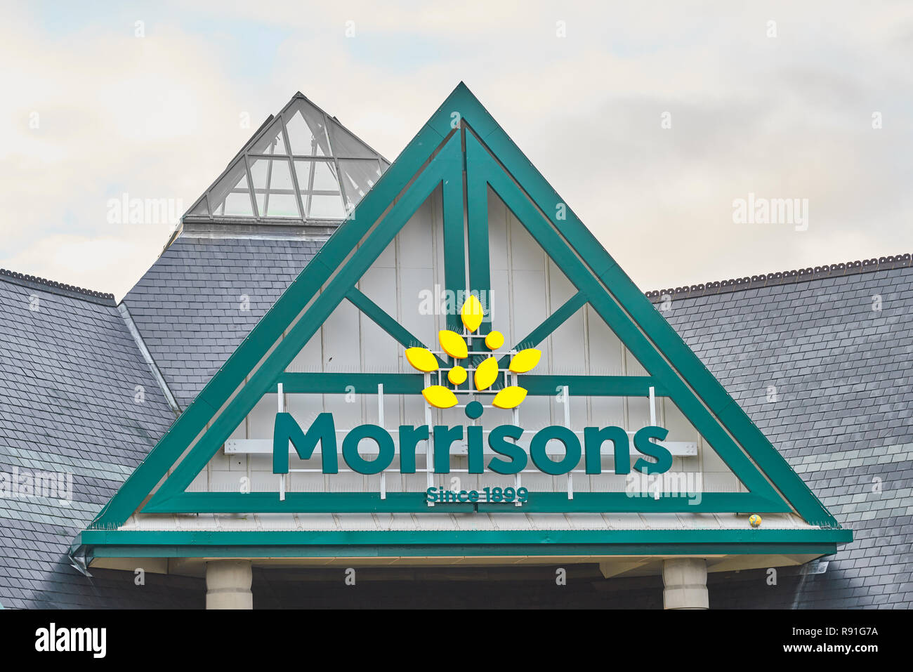 Morrisons name and logo on the roof of one of their superstores. Stock Photo