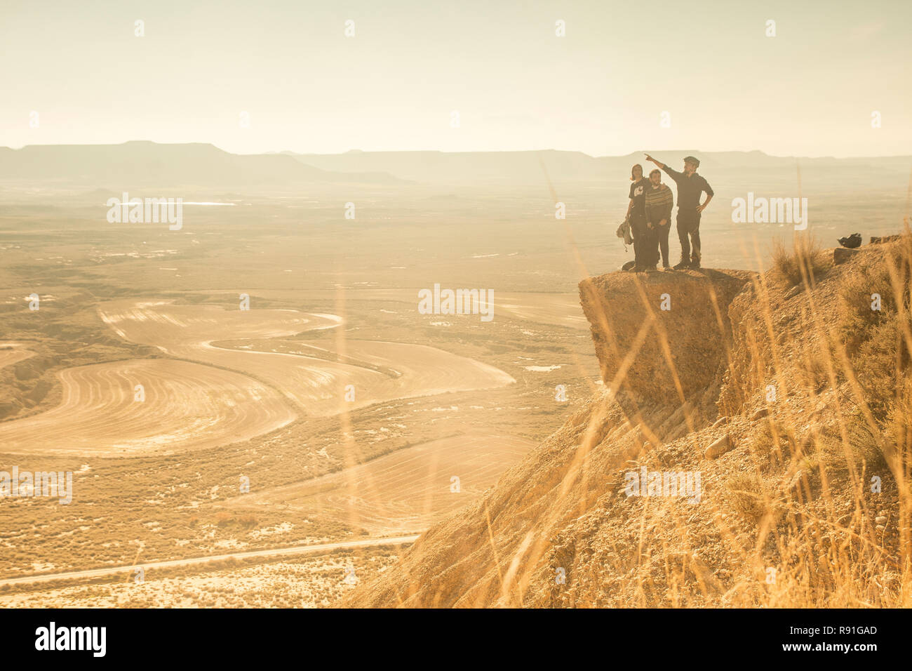 Friends at sunset in Bardenas Reales, Navarra Stock Photo