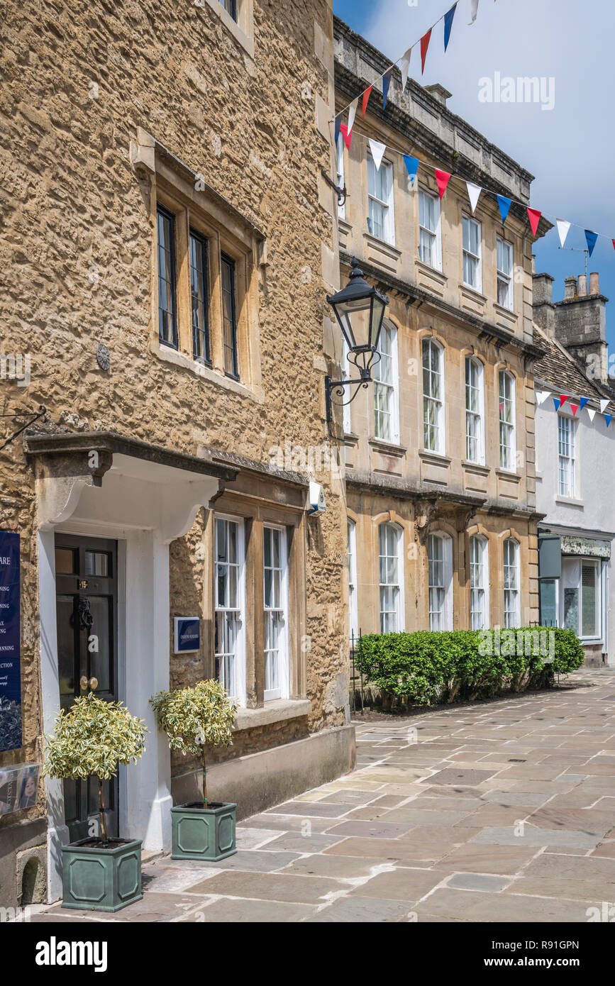 A village lane with flowers in Corsham, Wiltshire, England Stock Photo