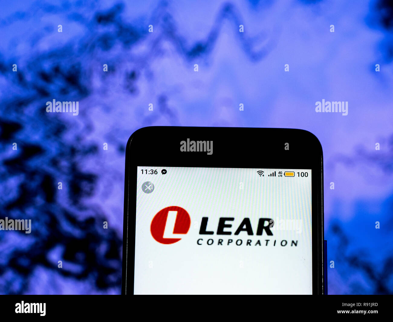 Lear Corporation Manufacturing company logo seen displayed on smart