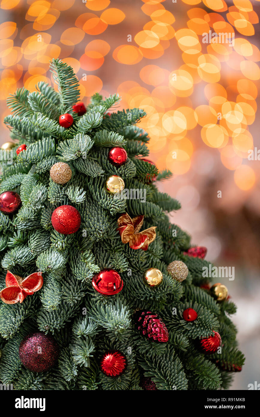 Beautiful Small Decorated Christmas Tree On Dark Wooden Table