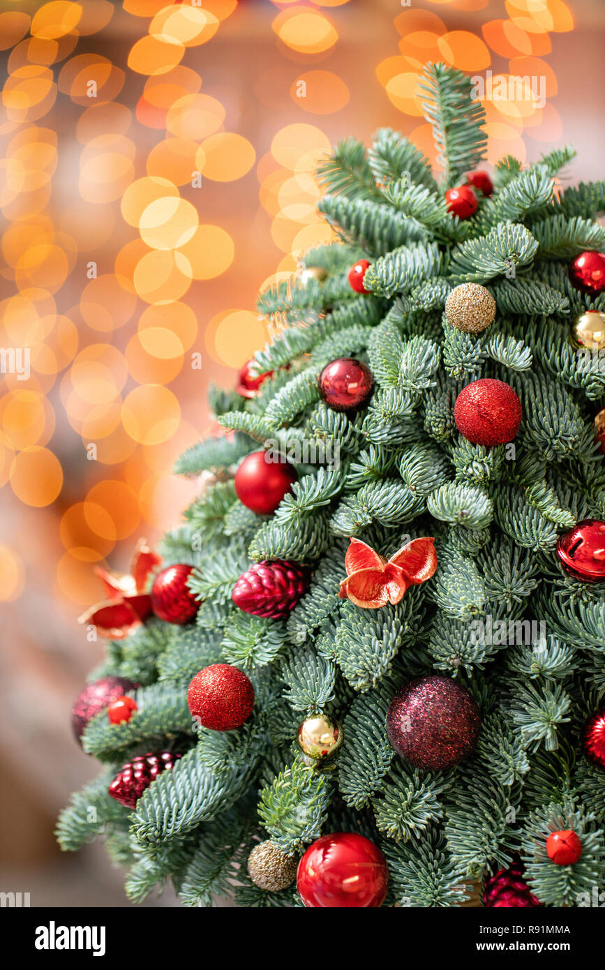 Beautiful Small Decorated Christmas Tree On Dark Wooden Table