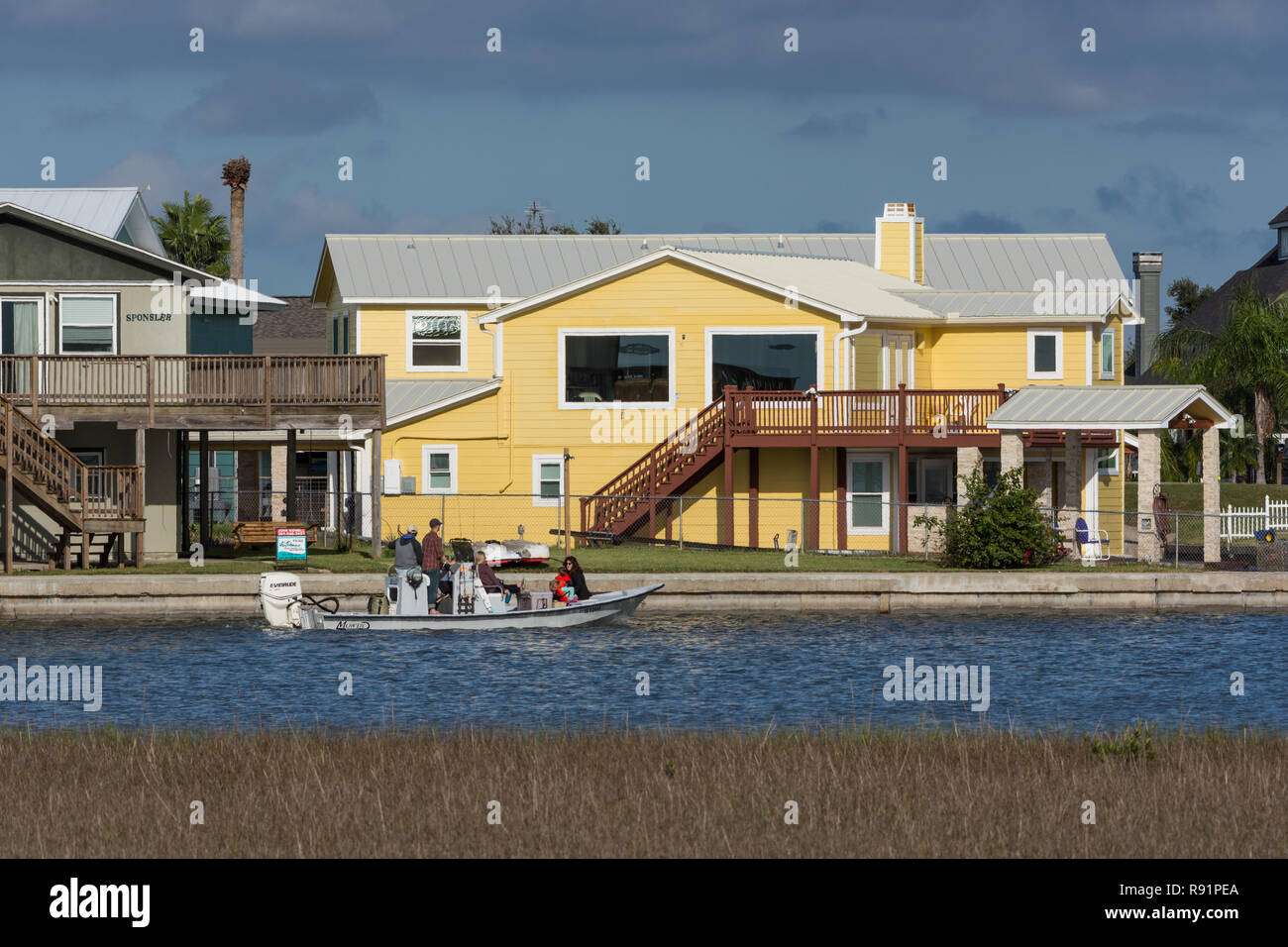 Residential houses encroaching coastal wetlands. Aransas National Wildlife Refuge, Texas, USA. Stock Photo