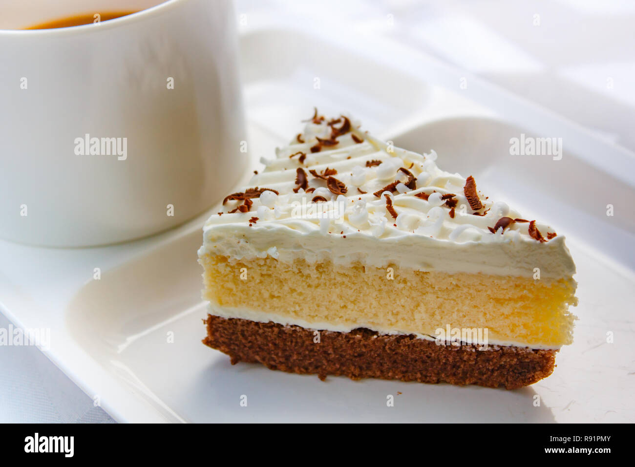 Break Time Concept With Cake Two Tone Vanilla And Chocolate And Coffee Stock Photo Alamy