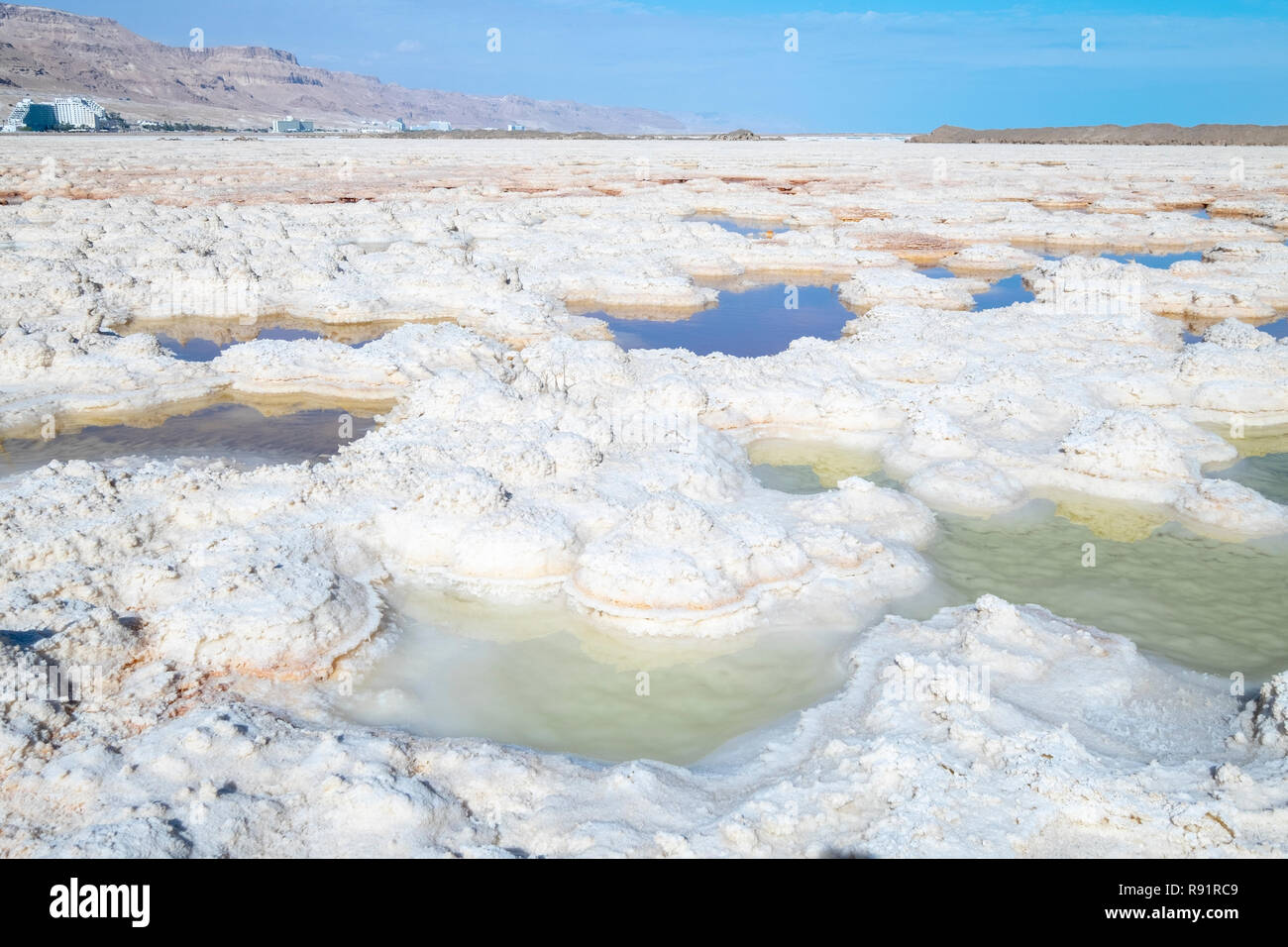 Salt formation caused by the evaporation of the water on the shore of