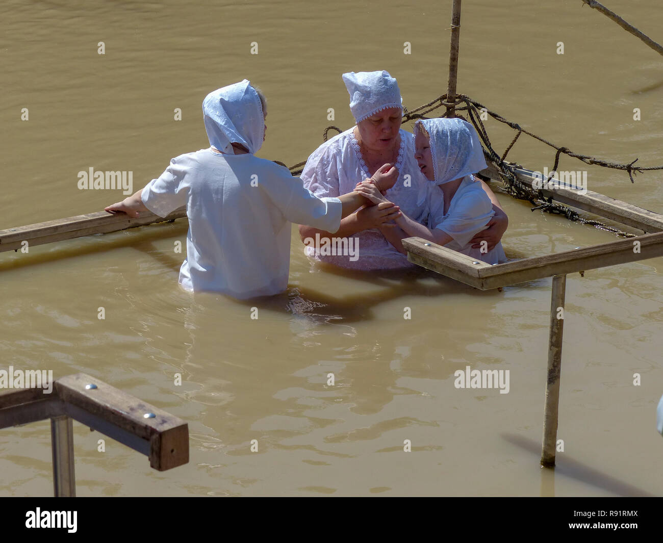 Qasr el Yahud (lit. 'Castle of the Jews'), is the official name of a baptism site in the Jordan River Valley in the West Bank. It is the western part  Stock Photo