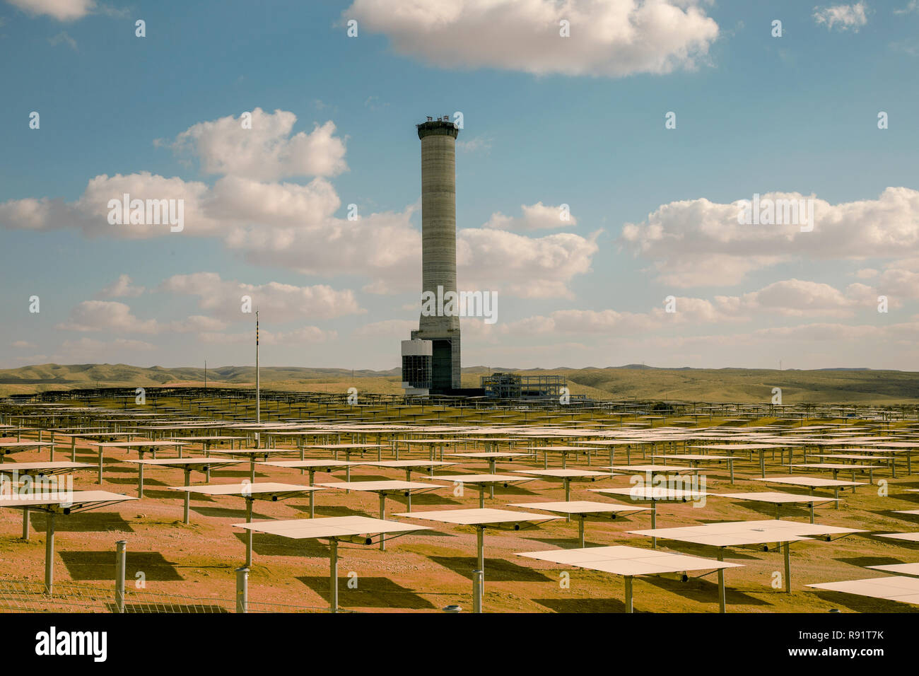 The Ashalim Solar Power station is a solar thermal power station in the Negev desert near the kibbutz of Ashalim, in Israel. The station will provide  Stock Photo