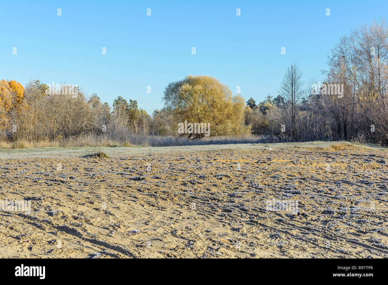 Beach Sand In Frost, River Bank, Shore Stock Photo
