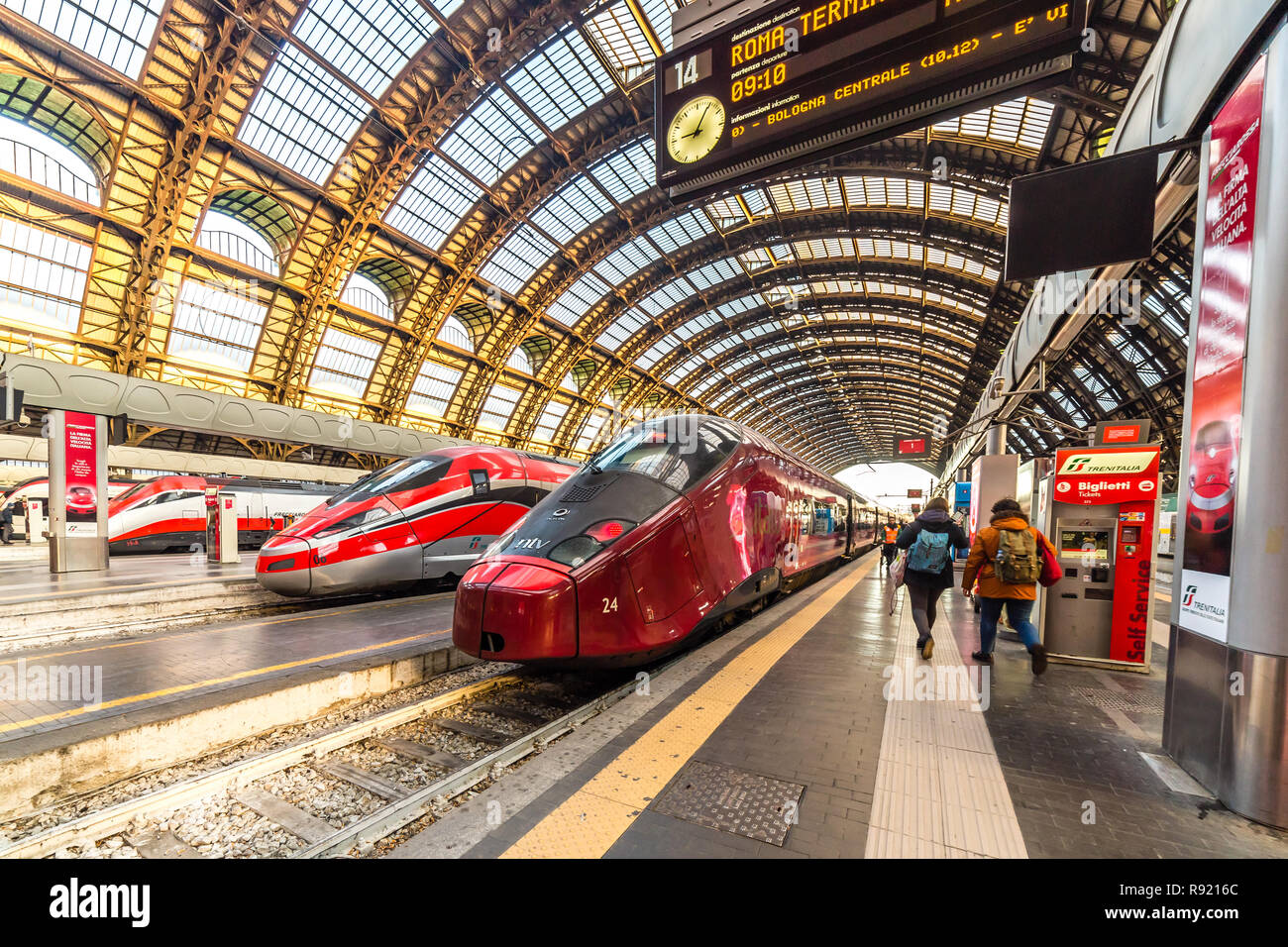 MILANO, ITALY - DECEMBER 12, 2018: TRENITALIA FRECCIAROSSA and NTV ITALO  trains waiting at Milano Centrale station Stock Photo