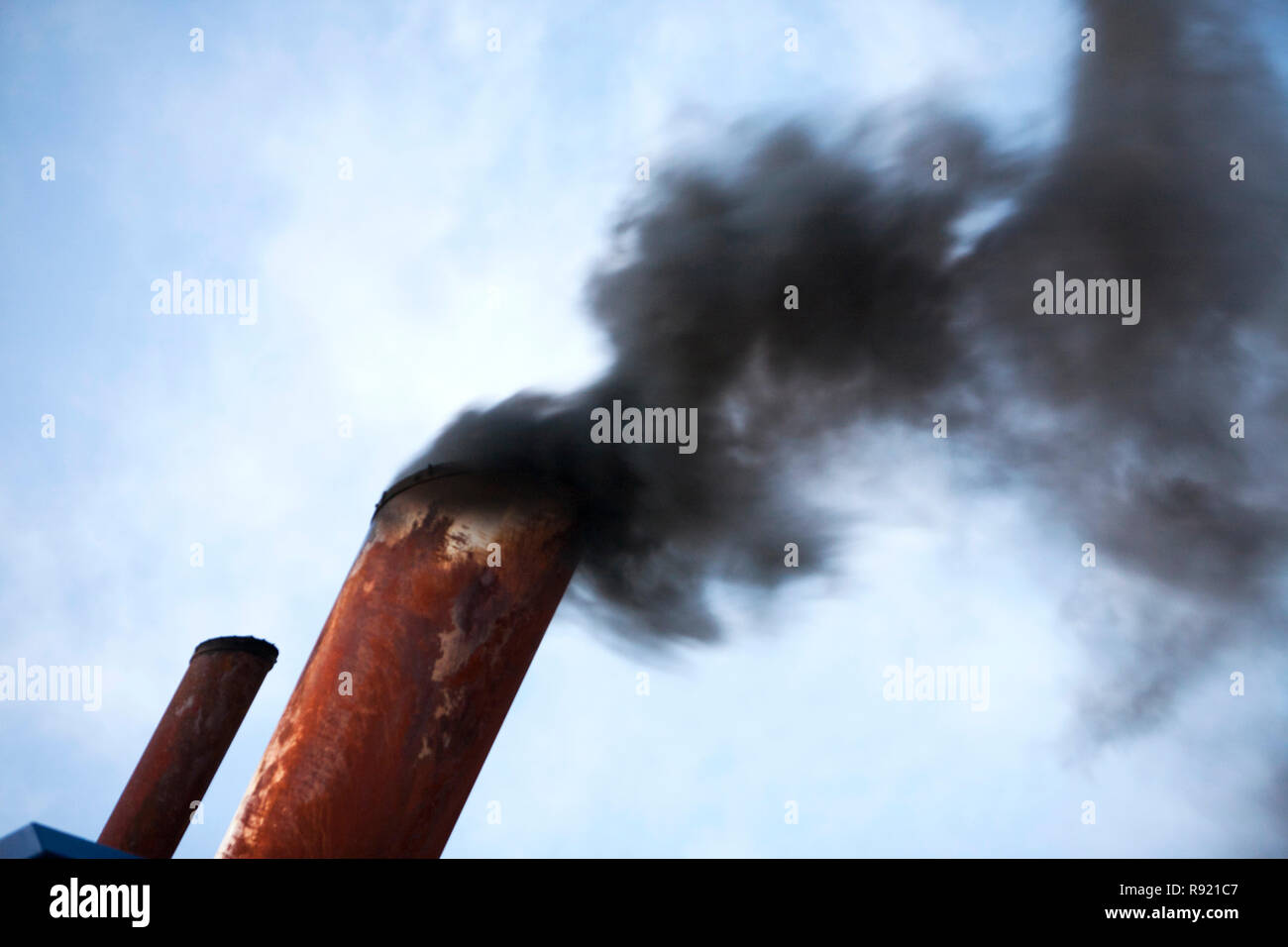 Exhaust emissions, the result of burning marine diesel in a ships engine. Marine diesel is one of the most polluting fuels in the world. Stock Photo