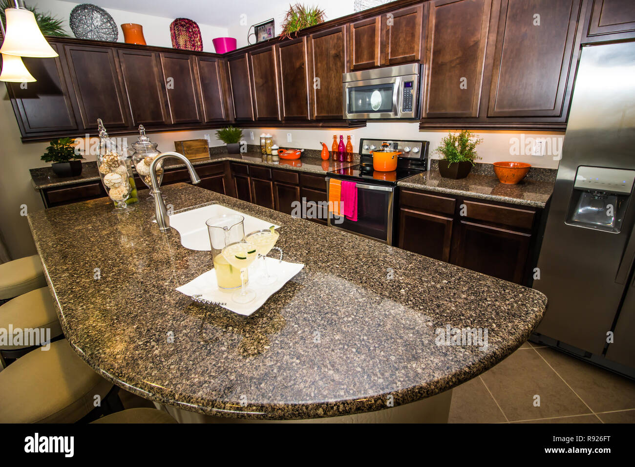 Modern Kitchen With Granite Counter Island Stock Photo - Alamy