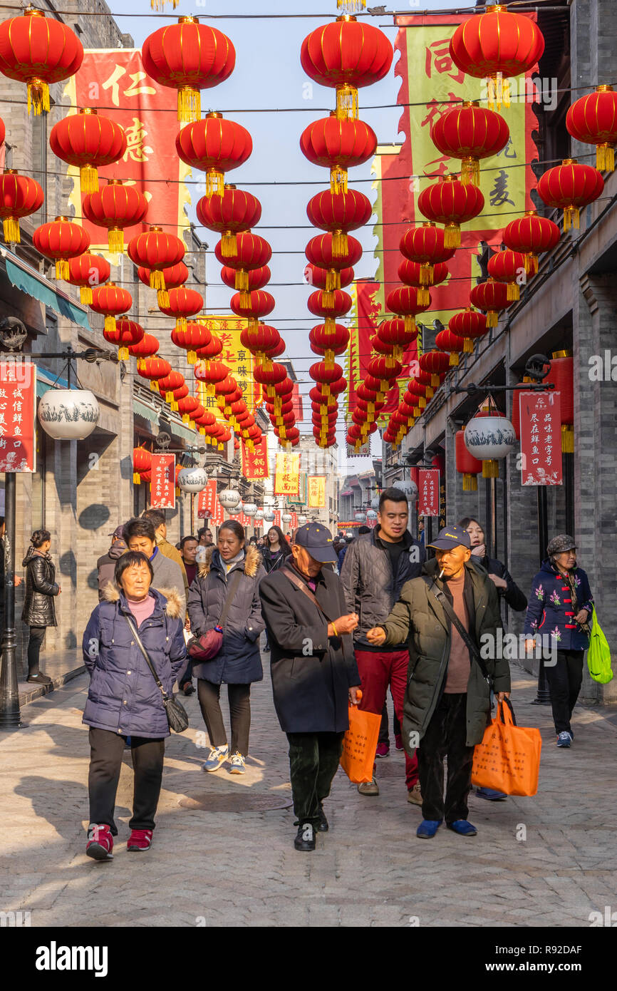 Chinese walking along a traditional shopping street in Beijing Stock Photo
