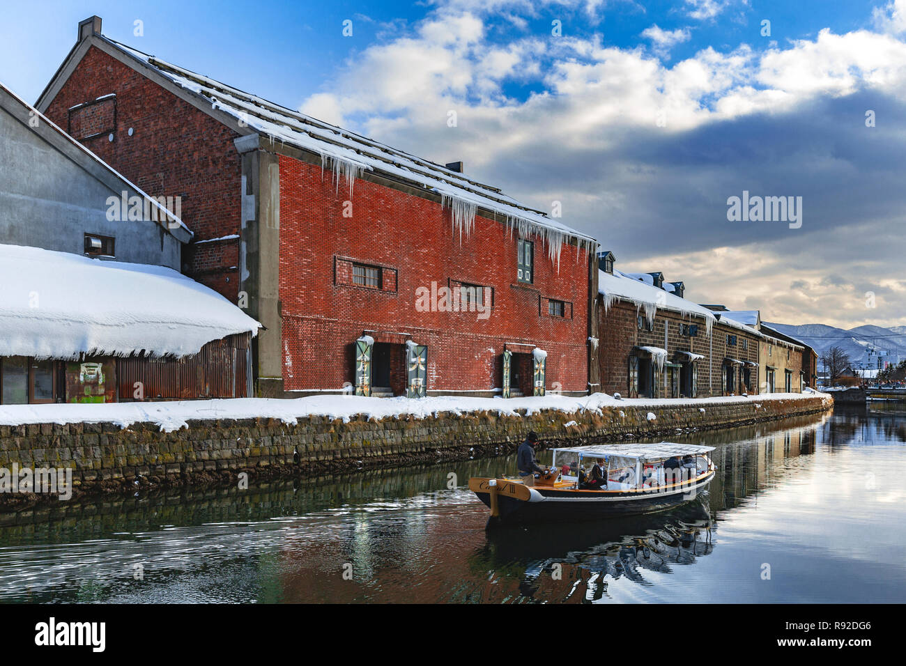 The historic Otaru Canal and the warehouse district in winter. Minatomachi, Otaru, Hokkaido, Japan. Stock Photo