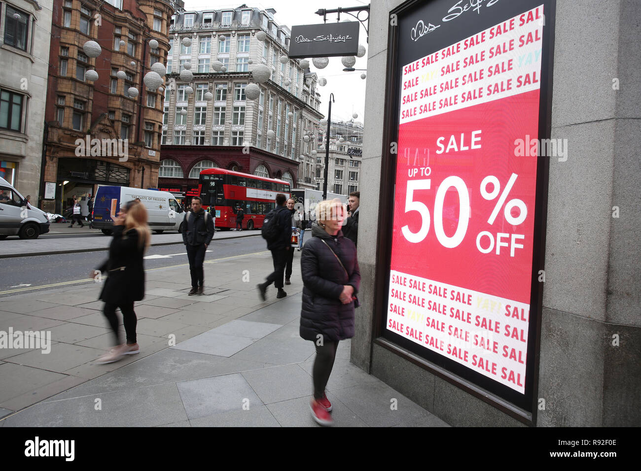 London, UK. 18th December, 2018. The crisis on Britain’s high streets is to intensify this Christmas, with shopkeepers preparing themselves for the quietest festive period since the credit crunch, according to forecasts. Many stores around the country have taken to slashing their prices and starting their sales early such as these in Londons Oxford Street. Credit: Nigel Bowles/Alamy Live News Stock Photo