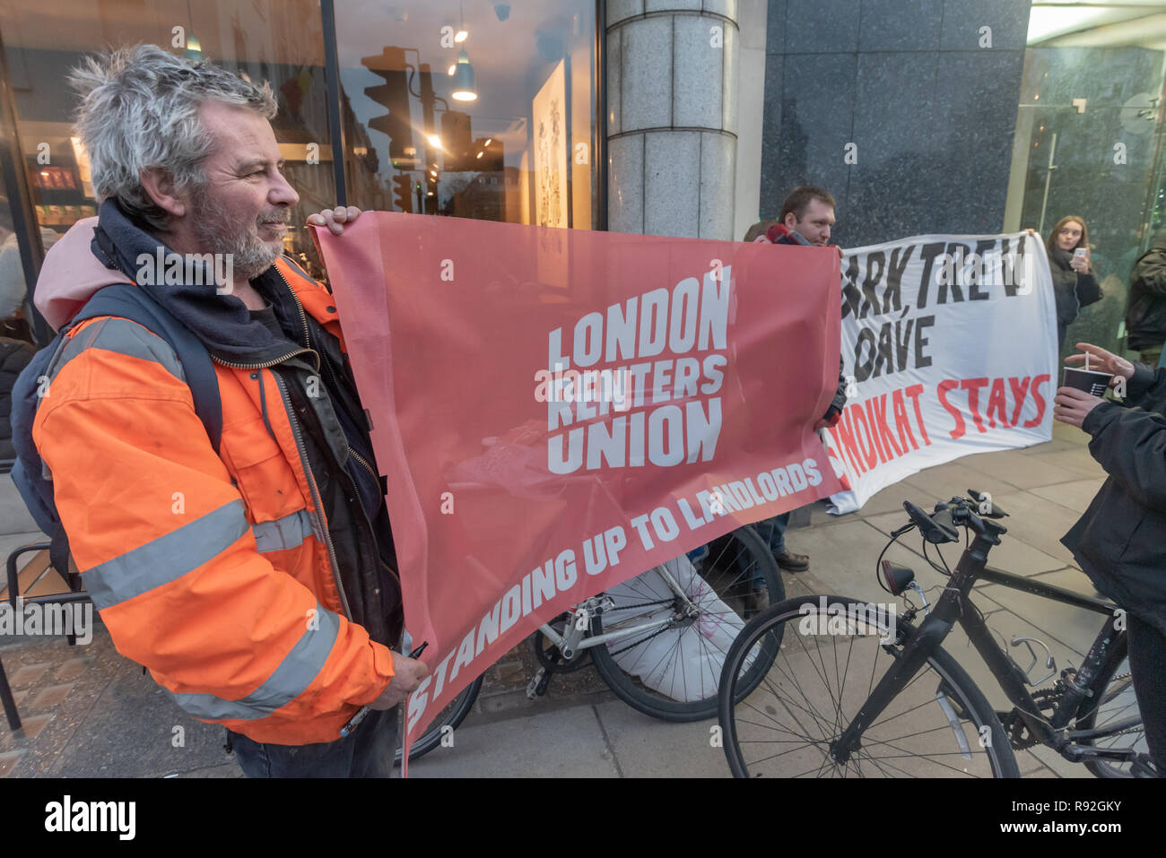 London, UK. 18th December 2018.  London Renters Union  supporting the protest by Berlin community centre and pub Syndikat outside the London offices of their landlord, Global Real Estate Investors Limited, owned by the secretive Pears brothers, three of the richest men in the UK, who through various 'letterbox' companies own around 6200 properties in Berlin, against notice to quit  at the end of December. Credit: Peter Marshall/Alamy Live News Stock Photo