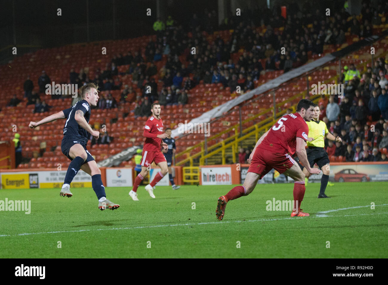Pittodrie Stadium, Aberdeen, UK. 18th Dec, 2018. Ladbrokes Premiership football, Aberdeen versus Dundee; Calvin Miller of Dundee scores for 4-1 in the 68th minute Credit: Action Plus Sports/Alamy Live News Stock Photo