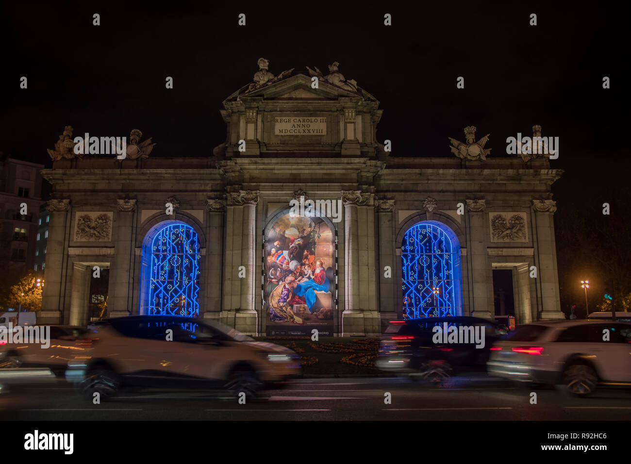 Madrid, Spain. 18th December, 2018. Big painting of ¨Belen¨in the principal avenue of Madrid, Spain Alcala. a wide angle picture of the painting in la puerta de alcala. a wide angle picture of the painting in front of la puerta de alcala Credit: Alberto Sibaja Ramírez/Alamy Live News Stock Photo