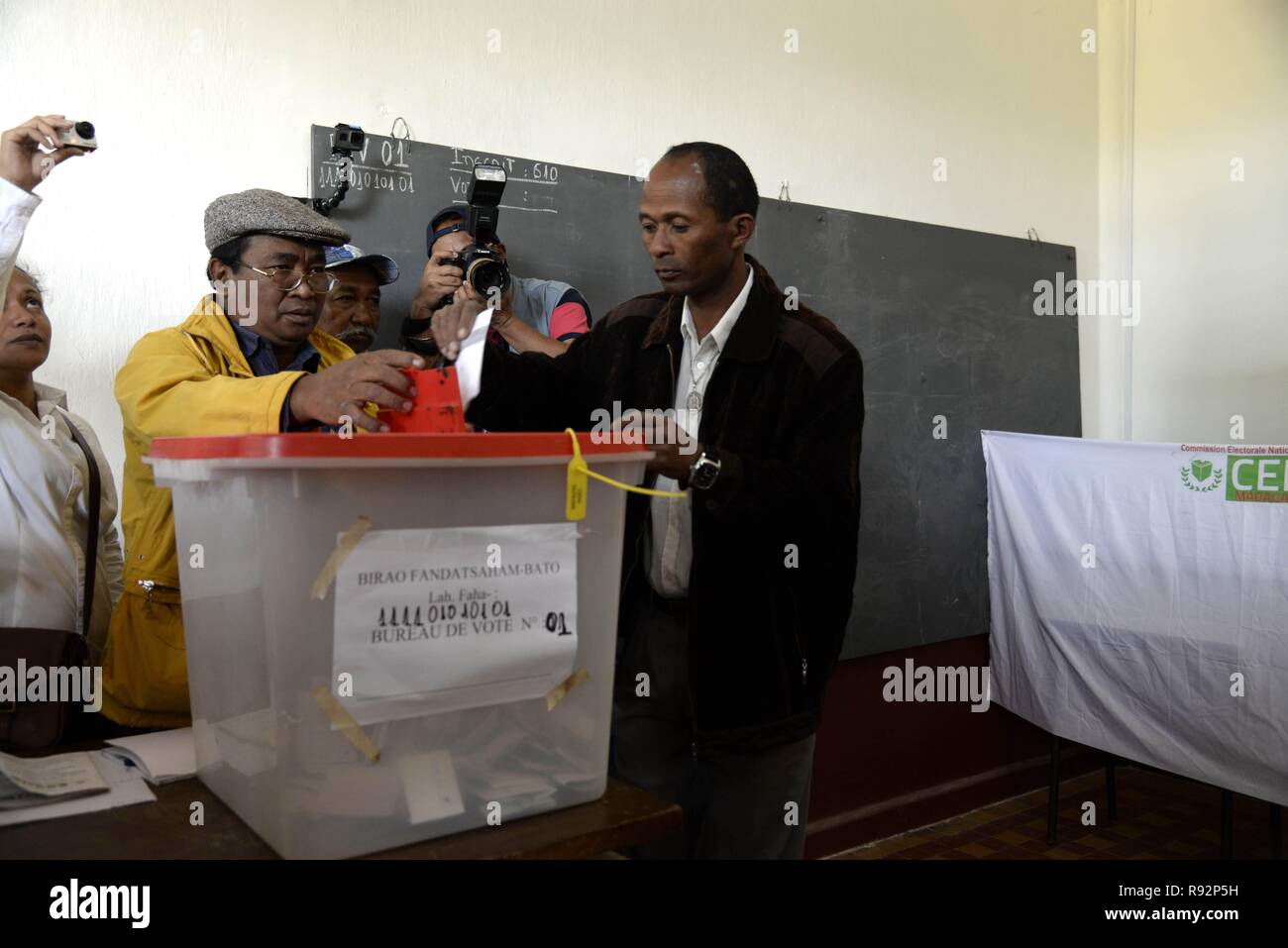 Antananarivo, Madagascar. 19th Dec, 2018. A voter casts his ballot at a polling station in Antananarivo, Madagascar, Dec. 19, 2018. Voters went to the polls in Madagascar's second round presidential election on Wednesday to select a new president from two competing former presidents. Credit: Sitraka/Xinhua/Alamy Live News Stock Photo