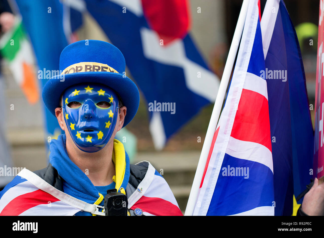 London 19th Dec 2018. Anti-Brexit protesters SODEM continue their daily Stop Brexit protest outside Parliament. Steve Bray (the man with the placards in the background of every news programme) in the mask Credit: PjrFoto/Alamy Live News Stock Photo