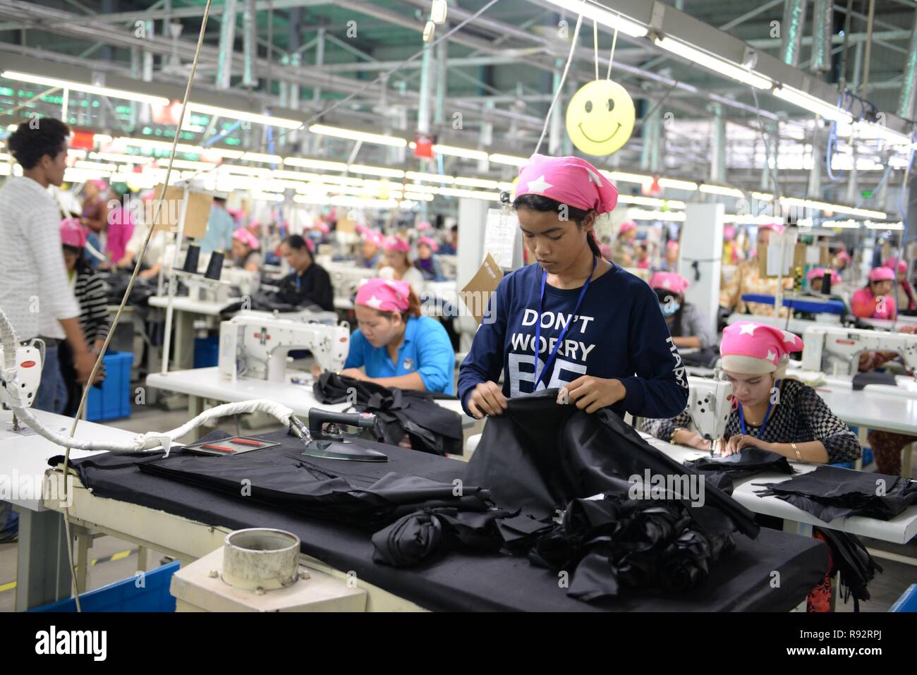 Beijing, China. 19th Dec, 2018. Workers are busy at Chinese enterprise HoDo Group in the Chinese-operated Sihanoukville Special Economic Zone in Cambodia, June 6, 2016. Credit: Xinhua/Alamy Live News Stock Photo