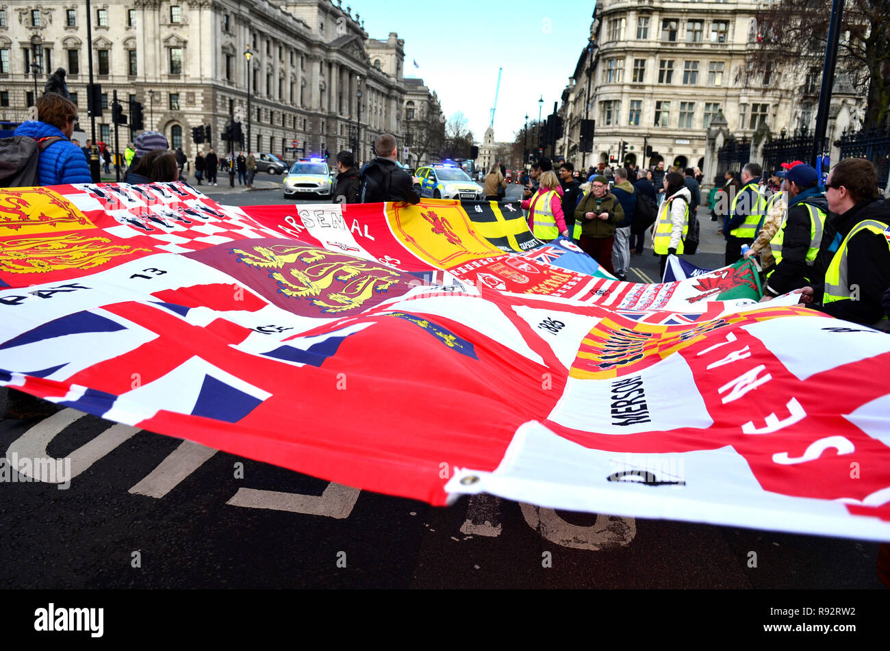 London, 19th December 2018. Pro Brexit supporters (who last week blocked Westminster Bridge) stop a car leaving the Houses of Parliament before moving out to block the road Credit: PjrFoto/Alamy Live News Stock Photo