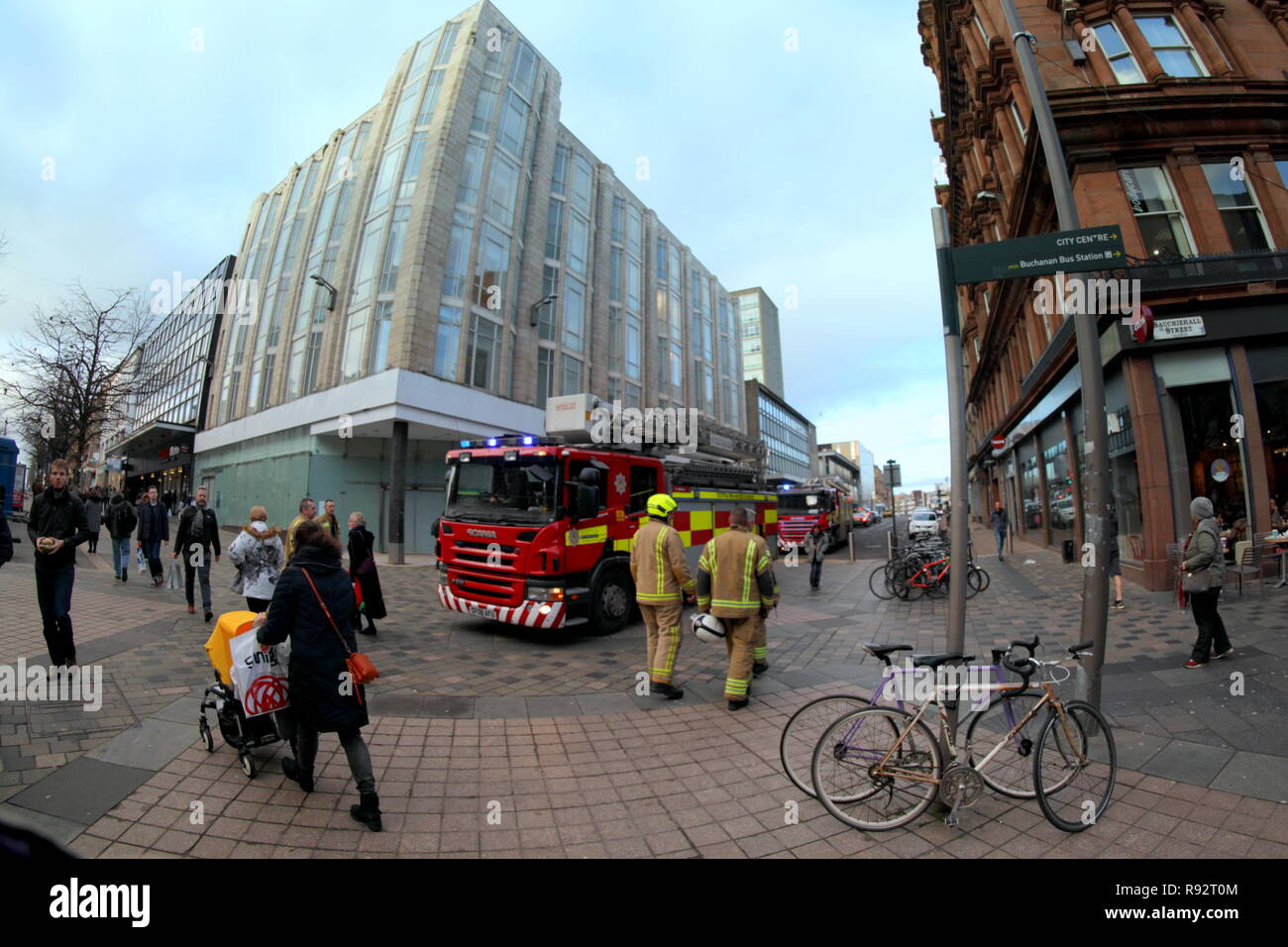 Glasgow, Scotland, UK, 19th December. Sauchiehall street received a majorr scare today as three fire engines appeared in the middle near the hill of the art school. The area has only just recovered from a series of major headline fires c entered around the Art school and the street itself. Traumatised shoppers where relieved when no major event was found. Credit Gerard Ferry/Alamy Live News Stock Photo