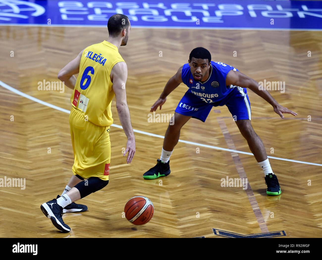 Opava, Czech Republic. 19th Dec, 2018. From left RADIM KLECKA of Opava and  JUSTIN ROBERSON of Fribourg in action during the Men's basketball Champions  League 9th round match, B Group Opava vs.