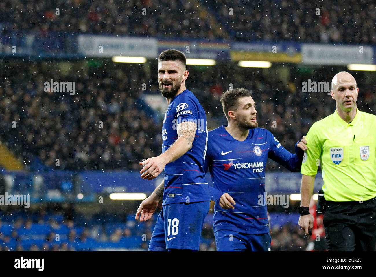 London, UK. 19th Dec, 2018. Olivier Giroud of Chelsea disagrees with the foul awarded against him during the EFL Carabao Cup Quarter Final match between Chelsea and Bournemouth at Stamford Bridge, London, England on 19 December 2018. Photo by Carlton Myrie. Editorial use only, license required for commercial use. No use in betting, games or a single club/league/player publications. Credit: UK Sports Pics Ltd/Alamy Live News Stock Photo