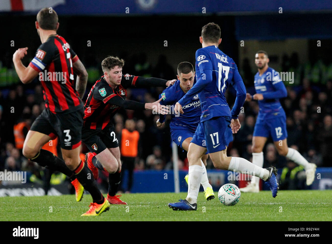 London, UK. 19th Dec, 2018. Jack Simpson of AFC Bournemouth grabs Eden Hazard of Chelsea during the EFL Carabao Cup Quarter Final match between Chelsea and Bournemouth at Stamford Bridge, London, England on 19 December 2018. Photo by Carlton Myrie.  Editorial use only, license required for commercial use. No use in betting, games or a single club/league/player publications. Credit: UK Sports Pics Ltd/Alamy Live News Stock Photo