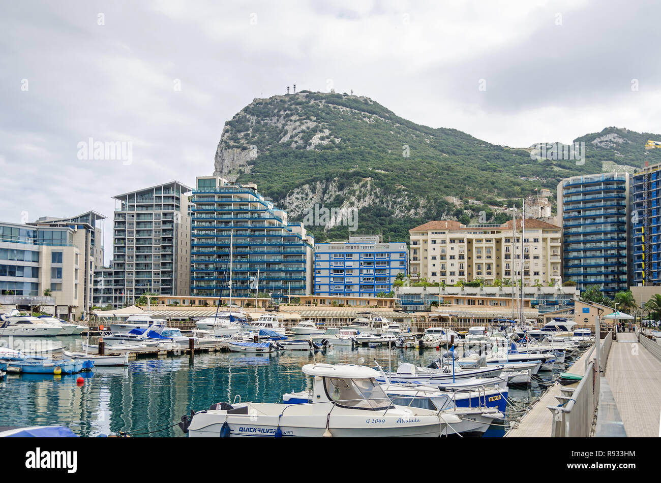 Gibraltar, British Overseas Territory -  November 8, 2018: Strait and Rock of Gibraltar with the Marina Bay Square and the Ocean Village Stock Photo